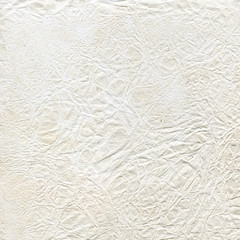 Natural decorative Chinese rice paper texture. Beige, yellow recycled crumpled background.