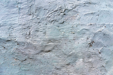 gray cracked concrete wall covered with gray cement texture as background