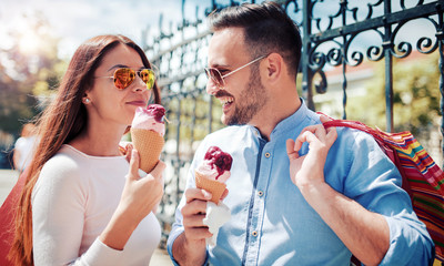 Shopping time. Beautiful couple in shopping. Consumerism, shopping, lifestyle concept