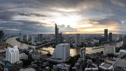 Bangkok city - Beautiful sunset curve Chao Phraya River panoramic Cityscape urban  of Bangkok city at night  , panorama landscape Thailand