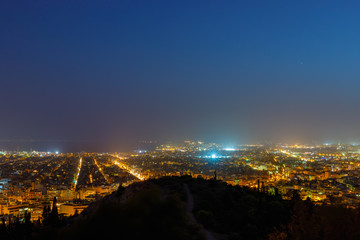 Fototapeta premium Athens, Greece, view from Filopappou Hill or Hill of the Muses at night