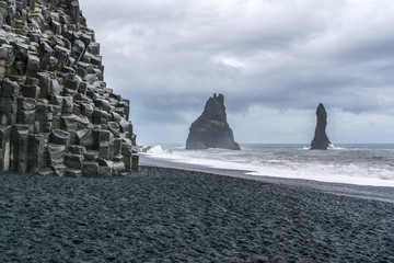 Basalt stacks of Reynisdrangur at Reynisfjara beach, Iceland