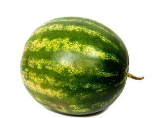 Ripe striped tasty watermelon close on a white background isolated