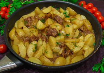 Fresh veal, stewed with potatoes at home.