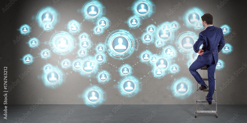 Poster Businessman using social network interface on a wall 3D rendering