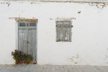 Fototapeta na wymiar old Door and window with white wall