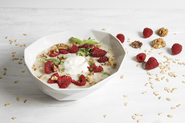 Overnight bircher muesli with walnuts, raspberry and mint