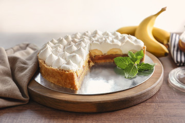 Delicious banana cake on table