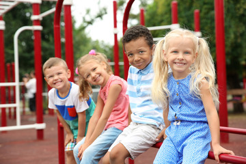 Fototapeta na wymiar Cute children on playground