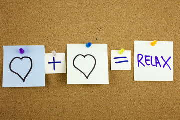 A yellow sticky note writing equation love or romantic relationship relax concept presented as...