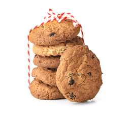 Delicious oatmeal cookies with raisins on white background