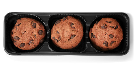 Delicious oatmeal cookies with chocolate chips in pack on white background