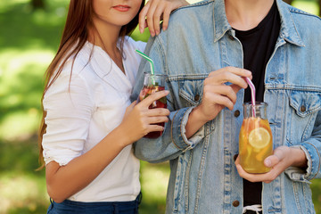 Healthy nutrition. Friends drinking fresh juice detox tea. Youth lifestyle, vegetarian diet to go,...