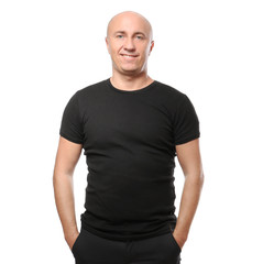 Bald man in black t-shirt on white background