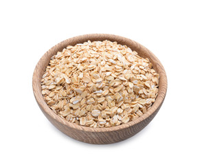 Wooden bowl with oatmeal flakes on white background
