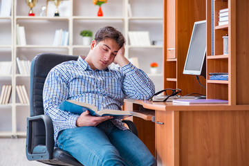 Young student at computer table