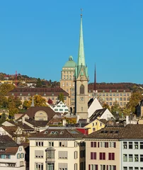 Deurstickers Buildings of the city of Zurich as seen from the Lindenhof park in autumn © photogearch
