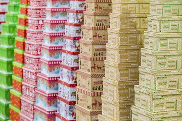 Christmas gift boxes standing in rows. Background texture of winter gifts