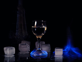 Fire on the wine glass, fire on the cocktail glass , vodka ice and fire