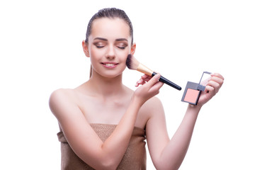 Woman in beauty concept applying make up using cosmetics