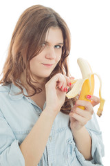sensual happy young woman with banana on white background isolated