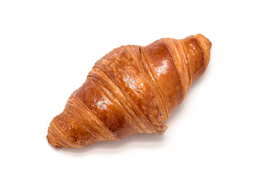 Fresh croissant isolated on white background, top view