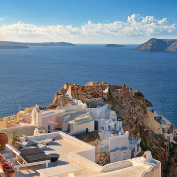 Typical architecture and Castle Ruins in Oia, Santorini, Greece