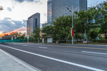 Fototapeta na wymiar empty asphalt road front of modern buildings.