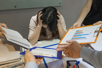 The manager tired of reading report, signing document