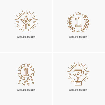 Set of four linear winner awards.