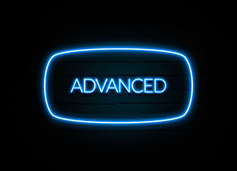 Advanced  - colorful Neon Sign on brickwall
