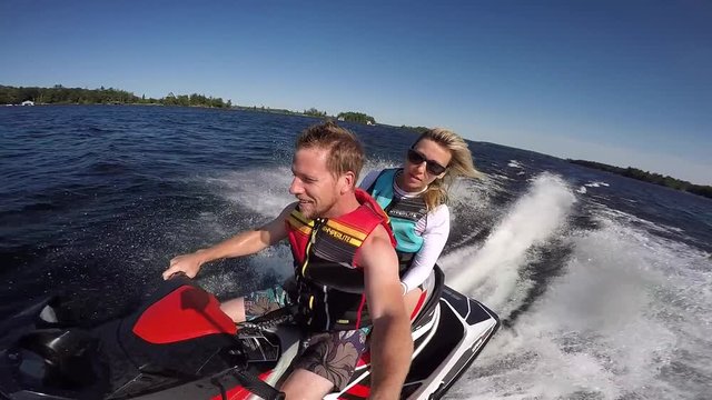 seadoo driver selfie him and passenger rough waves slow motion