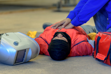 Welder accident while working in a work shop, factory construction