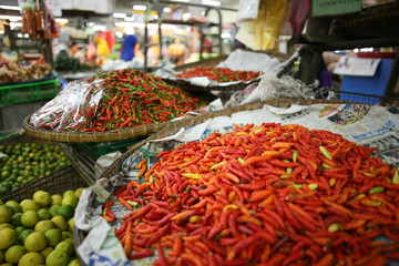 Chillis and limes for sale in a food market in Kota Kinabalu, Malaysia