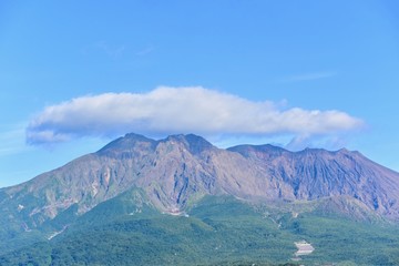 Scenic View of Cloud-Capped Sakurajima Volcano