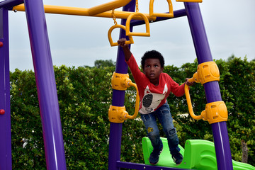 Fototapeta premium Kindergarten students play in the international kindergarten playground.