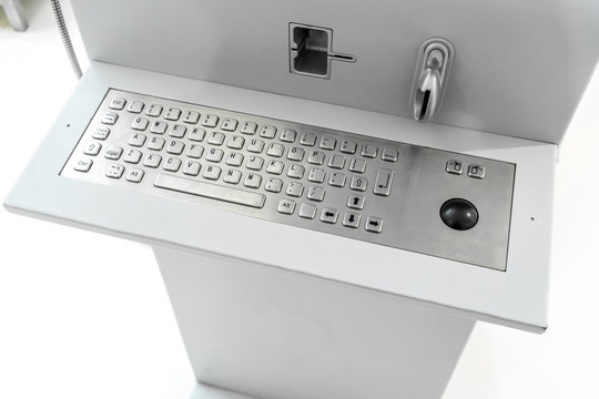 Metal keyboard with black roller ball and credit card reader