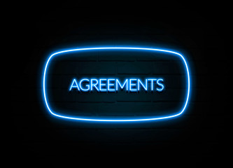 Agreements  - colorful Neon Sign on brickwall