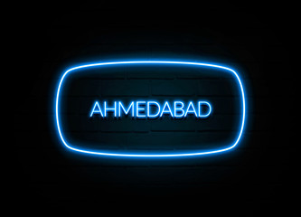 Ahmedabad  - colorful Neon Sign on brickwall