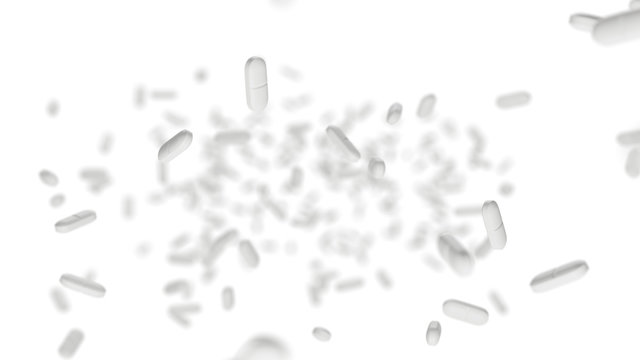 Falling White Pills On White Background