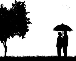 Lovely retired elderly couple stands under the umbrella in park in autumn or fall, one in the series of similar images silhouette