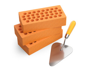 Bricks and trowel on white background.