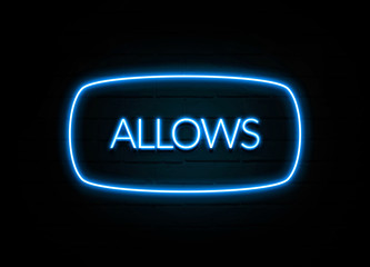 Allows  - colorful Neon Sign on brickwall