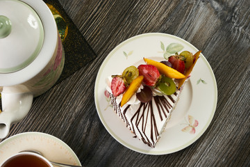 Slice of delicious tart with fresh fruits