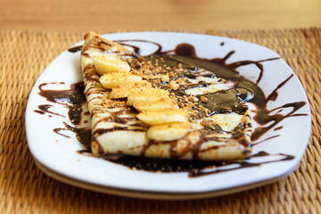 Pancake with banana and chocolate