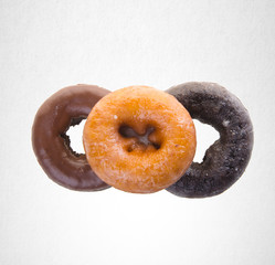Donut or Assorted donuts on a background.