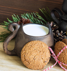Milk with cookies is a treat for Santa Claus. Close-up. Selective focus.