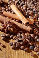 Aroma coffee chocolate cookies and spices on the wooden table. Dark wooden background. Top view. Close. Closeup.