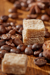 Aroma coffee chocolate cookies and spices on the wooden table. Dark wooden background. Top view. Close. Closeup.