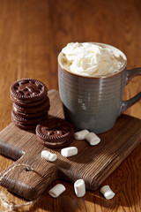 Aroma coffee candy chocolate cookies and spices on the wooden table. Christmas sweets. Dark wooden background. Top view. Close. Closeup.
